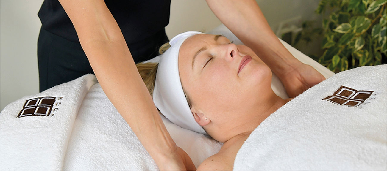 skincare treatment, female client recieving facial massage